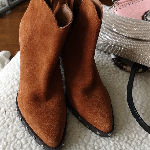 Shoes - Brand new. Guess all leather boot with rivets on the edge of the soles.